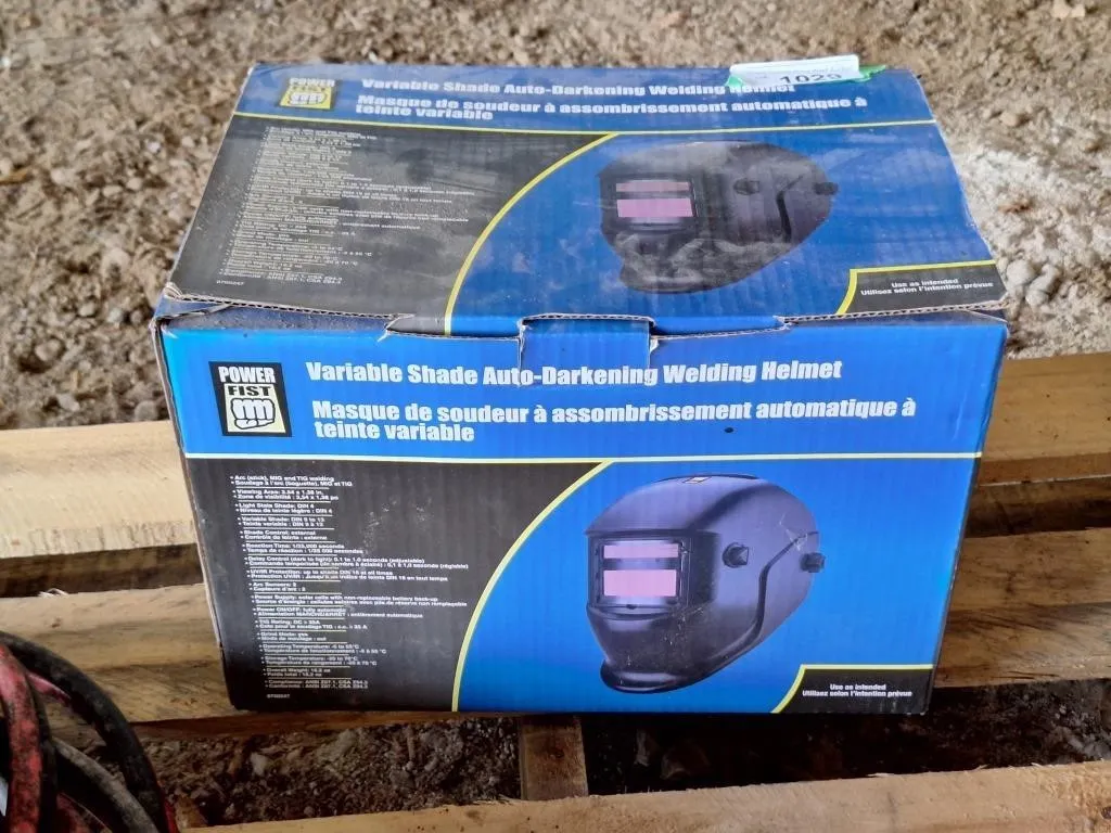 New. Power fist variable shade auto darkening
