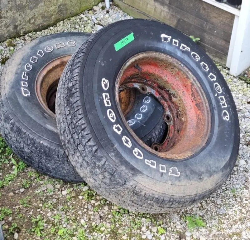 2 Firestone P235/75R15 tires