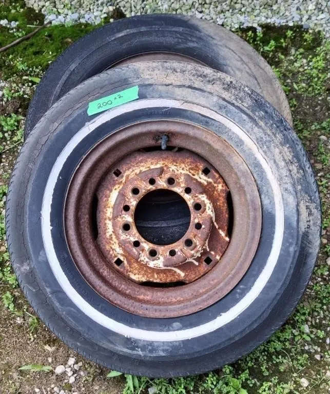 2 tires on rims. (1 is E78-14)