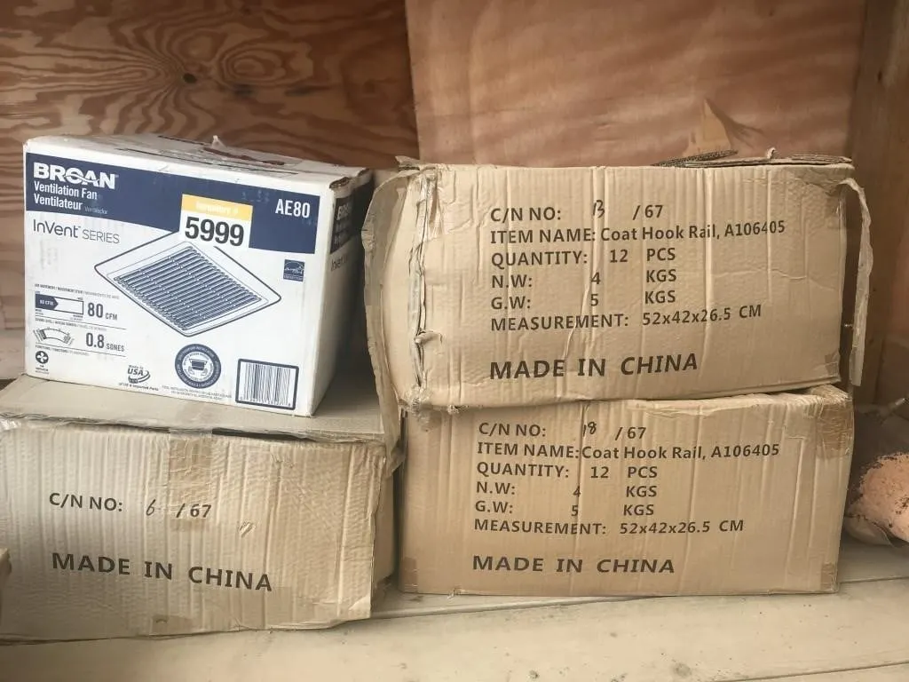 Four Boxes of Coat Hangers & Bathroom Fan