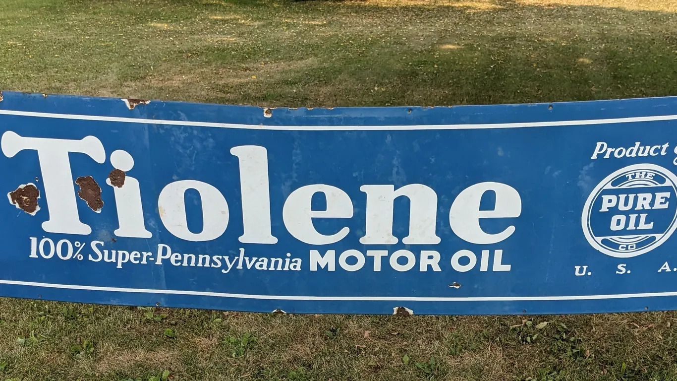 PORCELAIN SIGN TIOLENE MOTOR OIL PRODUCT OF THE PURE OIL COMPANY