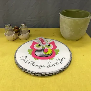 Decorative bowl, sign, and salt shaker holder