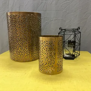 Gold cylinders and candle holders