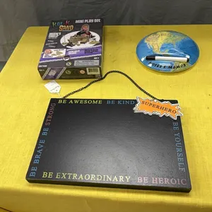 Sign, kwik sand, and note pad