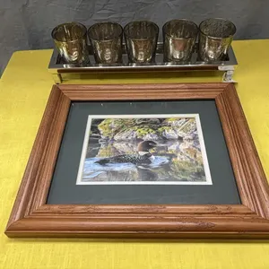 Votive holder and framed duck picture