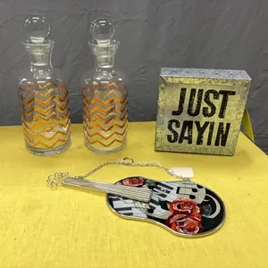 Vases, guitar decor, and light box