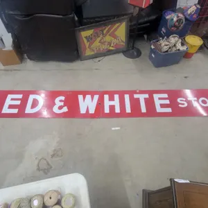 The Red and White Stores Porcelain Sign, 2-Piece, 18” × 196”
