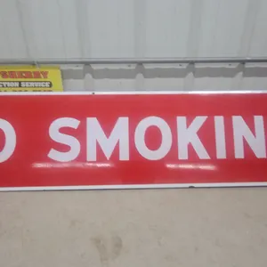 "No Smoking" Red and White porcelain Sign by P and M Manufacturing Ltd. 17”×71” originates from a