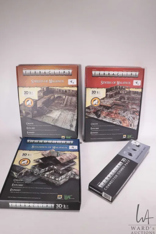 Three boxed sets for Malifaux including Bulidings of Malifaux, Sewers of Malifaux and Streets of Mal