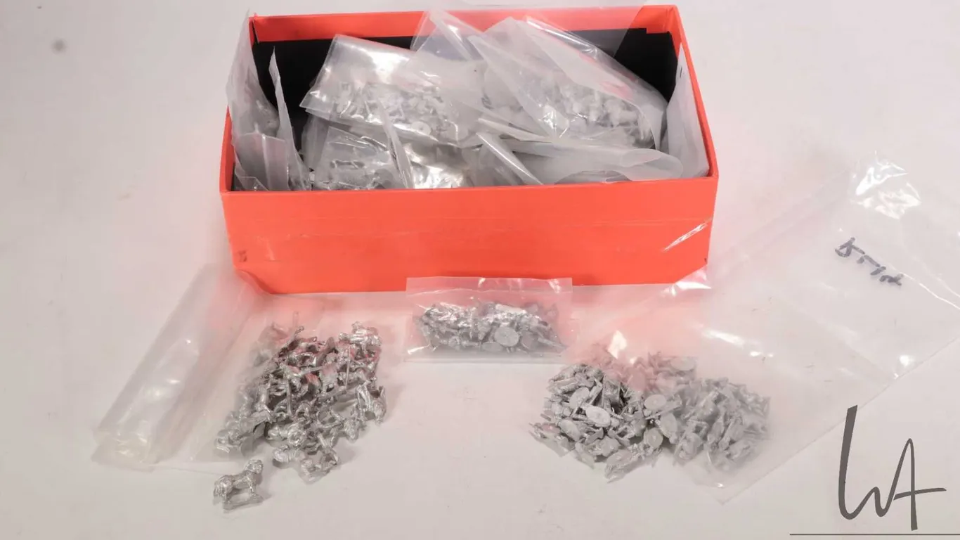 Large selection of metal miniatures including Roman horses, men, riders, weapons etc., approximately