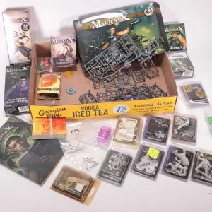 Tray lot of Malifaux gaming pieces including paintable plastic and metal gaming figures, boxed cards