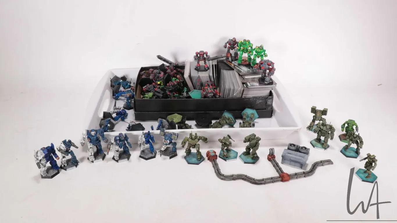 Selection of Battletech figures and gaming cards etc.
