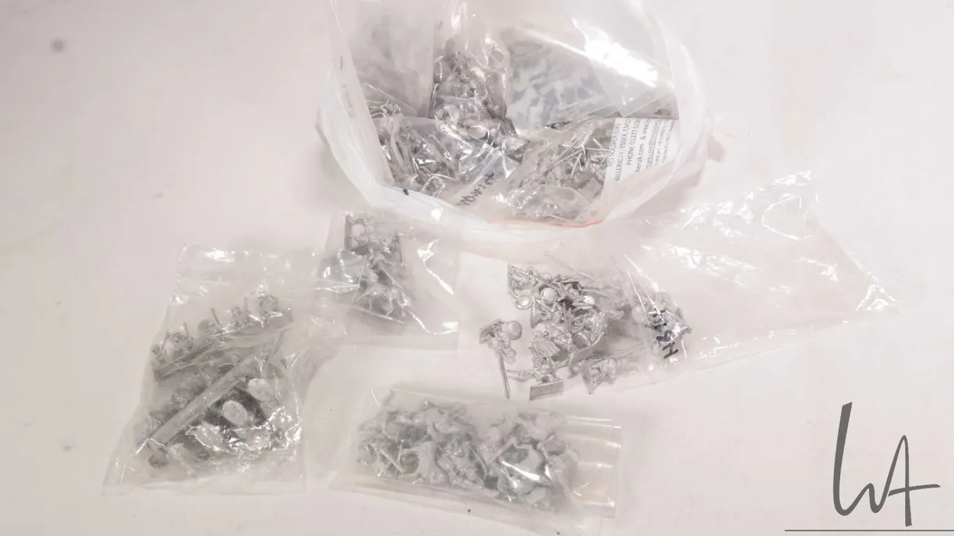 Large selection of metal miniatures including Roman soldiers, horses, riders and weapons etc., appro
