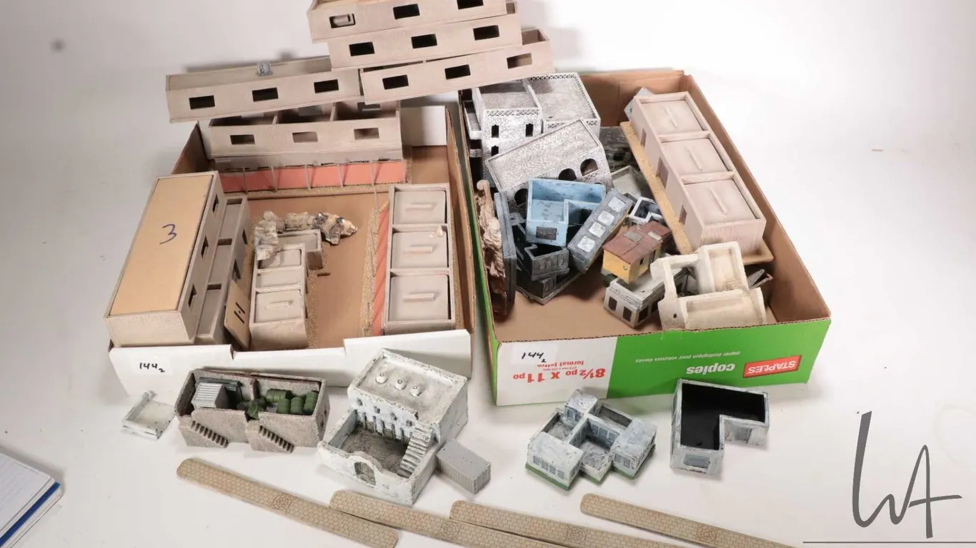 Two tray lots of built wooden buildings for gaming