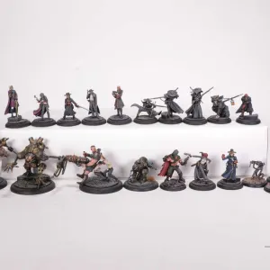 Twenty two painted tabletop war gaming figures, possbily from the Bloodborne or Malifaux board game,