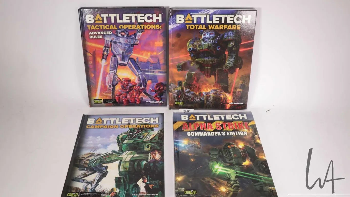 Four hardcover Battletech gaming books including "Alpha Strike Commander's Edition", "Campaign Opera