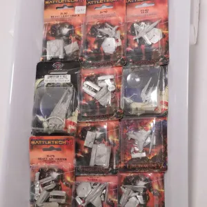 Twelve packaged Battletech metal vehicles