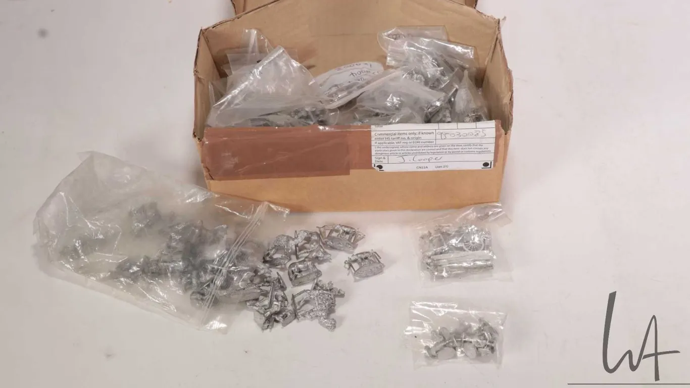 Large selection of 10mm metal miniatures including camp scenes, animals, covered wagons etc., approx