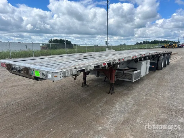 2009 Manac 10450B03 50 ft Quad/A Flatbed Trailer