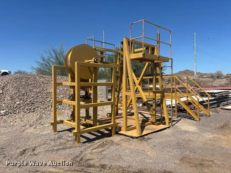 Track shoe/grouser rebuilding machine