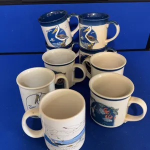 Collection of Nine Ceramic Bird Illustration Coffee Mugs