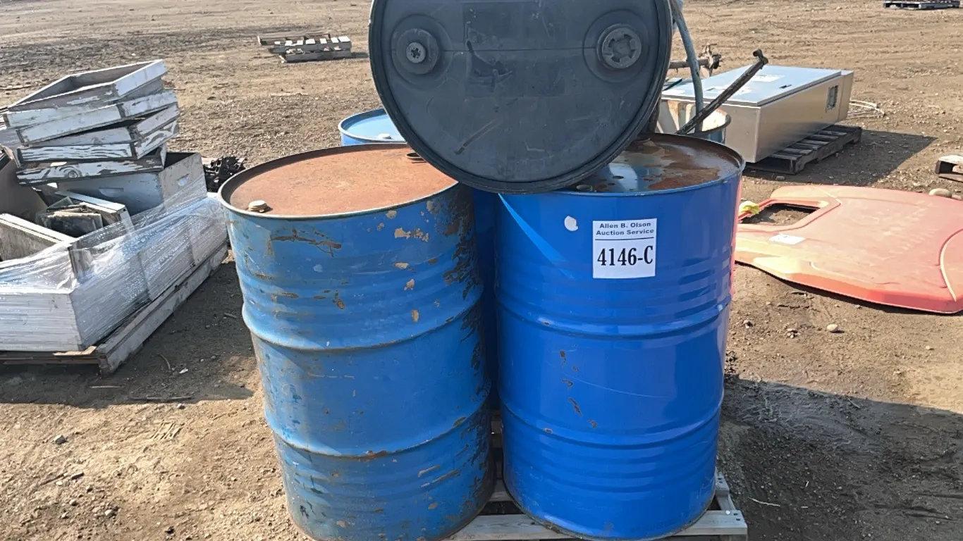 4 - METAL BURN BARRELS, 1 - PLASTIC BARREL