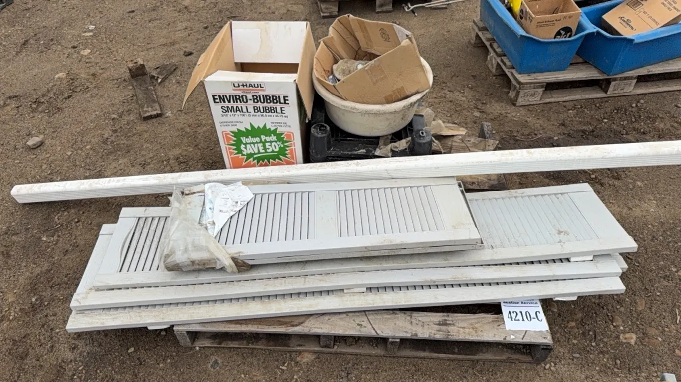 UNUSED EXTERIOR PLASTIC SHUTTERS, DOWN SPOUT, BUBBLE WRAP