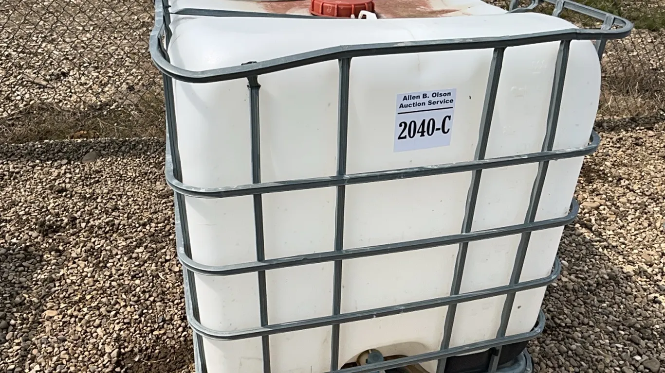 1000 LTR TOTE IN METAL CAGE
