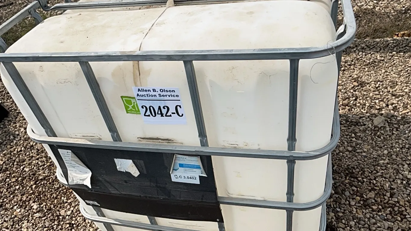 1000 LTR TOTE IN METAL CAGE