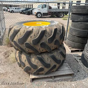 (2) 21L-24 tires and wheels