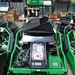 DENNIS ES-34R COMMERCIAL ELECTRIC WALK BEHIND TWIN BADE ROTARY MOWERS WITH ZIVAN ELECTRIC CHARGING