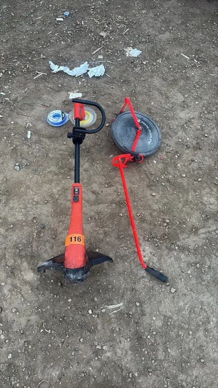 Weedwacker with string and rolatape