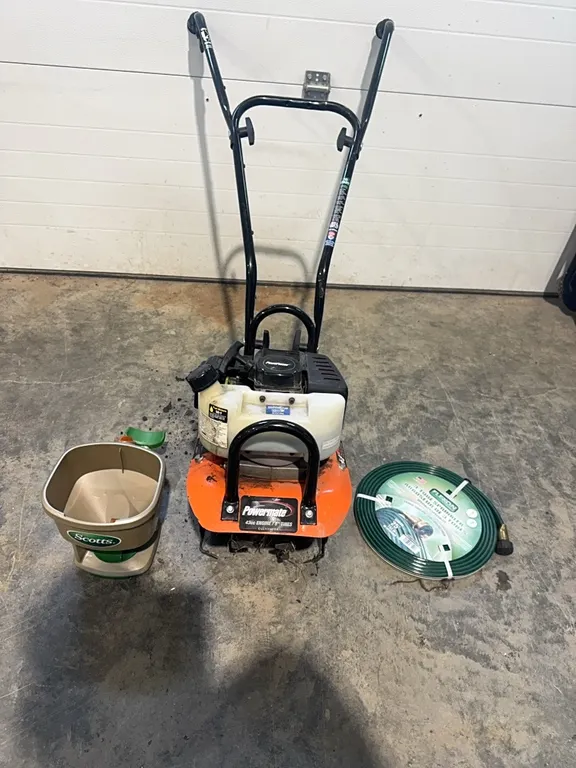 2 stroke tiller, sprinkler hose and handheld seeder