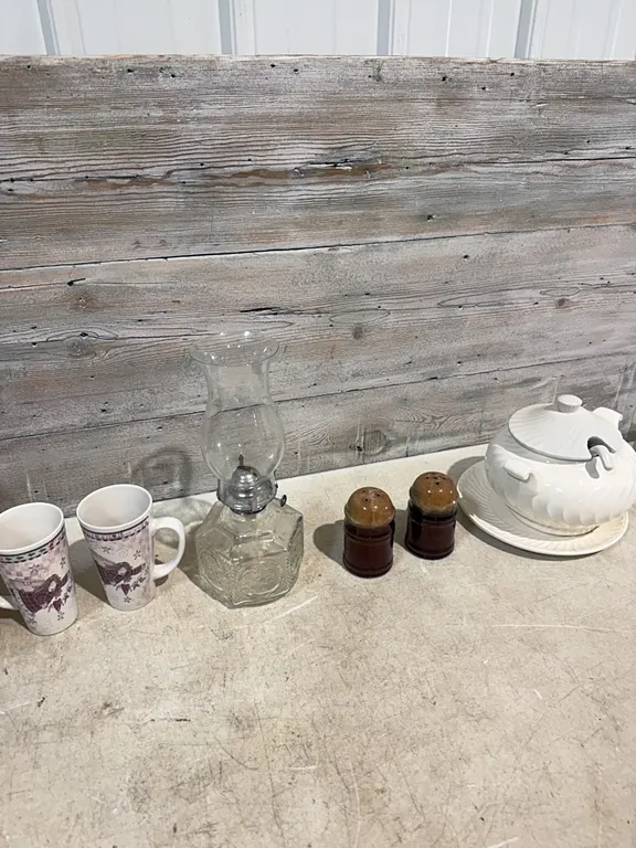 Soup serving bowl, coffee cups, salt and pepper shakers and kerosene lamps