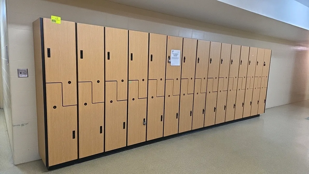 MultiSpace laminate wood 2-door lockers. Features an interlocking Z-door double-tier design, interior coat hooks, and recessed pull handles with padlo