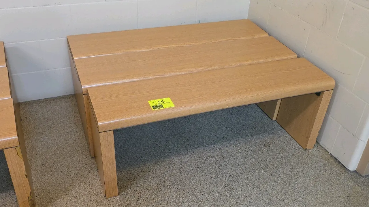 Laminate wood nesting benches. Features a light woodgrain finish and space-saving nesting design. 48"L. Note: Wear and laminate chipping present on so