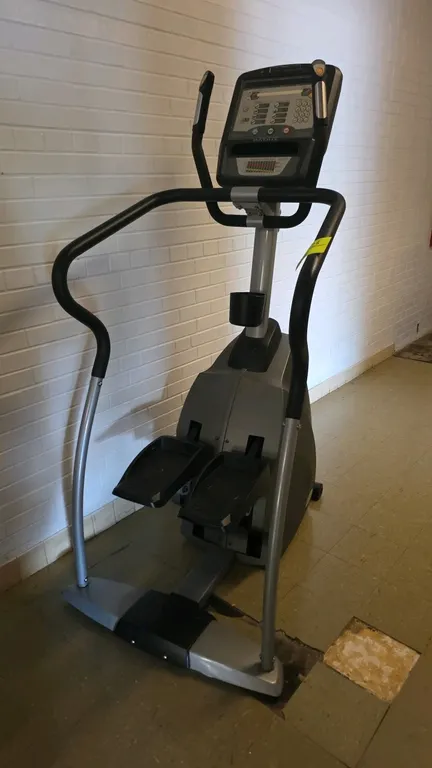 Matrix S-3x stepper. Features a digital console with multiple workout programs, integrated fan, numeric keypad, and target heart rate zone display. Eq
