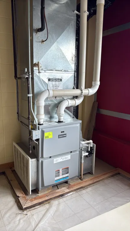 Concord natural gas furnace. Features high-efficiency PVC intake and exhaust venting.