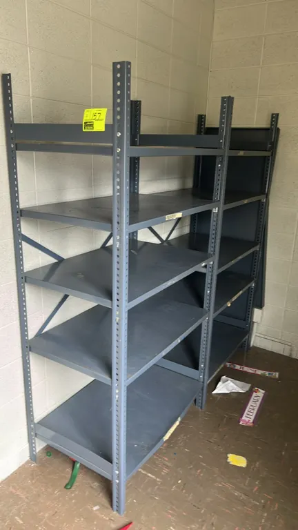 Metal multi-tier shelving racks. Features five shelf levels per unit and a grey metal frame. Dimensions: 3'L x 2'D x 6'H each.