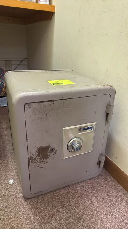 Sentry dial combination safe. Features a manual dial lock and single front door. Dimensions: 17"x17"x20". Note: Safe combination is not included.