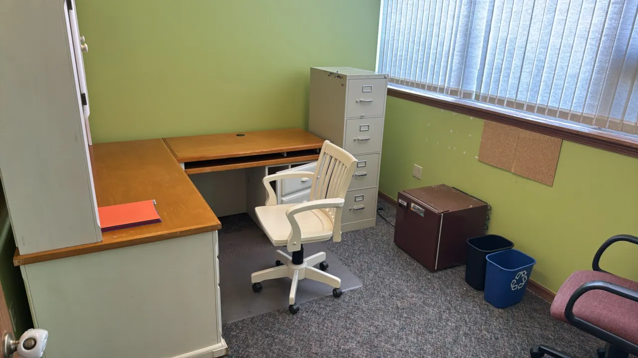Office package. Includes a 69"x80" corner desk with hutch, cream wooden swivel chair, burgundy fabric task chair, Hon beige 4-drawer metal filing cabi
