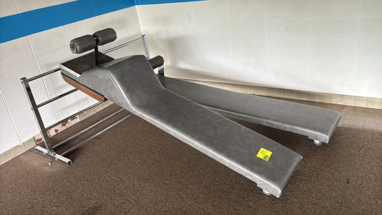 Padded sit-up benches with stand. Includes (1) contoured abdominal bench with dual foam roller pads and (1) flat slant bench with a single foam roller