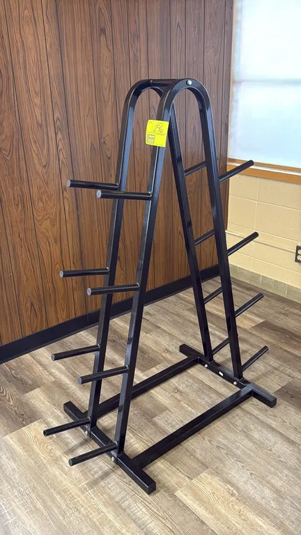 Metal weight rack. Features a black-finished metal A-frame design with 16 storage pegs. Dimensions: 30" x 55".