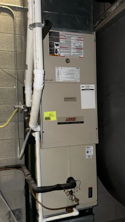Lennox Elite Series G51MP-60C-110-01 natural gas furnace. Features 1.0 HP blower motor. Electrical: 120V, 60 Hz, 1-Phase, 12.0 A. S/N: 6503D00635. Not