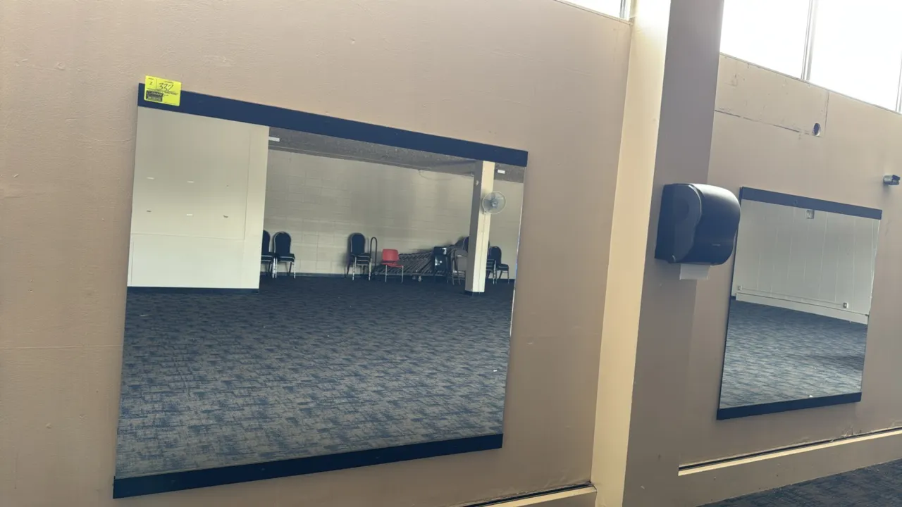 Wall-mounted mirrors. Features black metal top and bottom mounting trim. Dimensions: 5' x 4' each. Designed for wall mounting. Note: Buyer is responsi