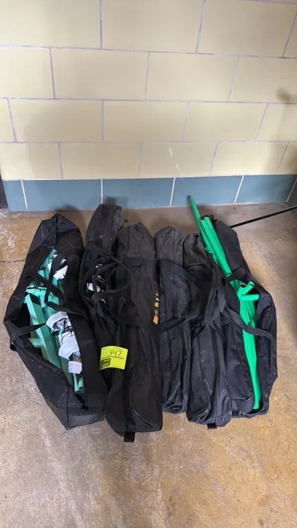 Various portable game nets. Includes Oncourt Offcourt Maxi-Net systems. Features (5) zippered black carrying cases containing disassembled metal frame