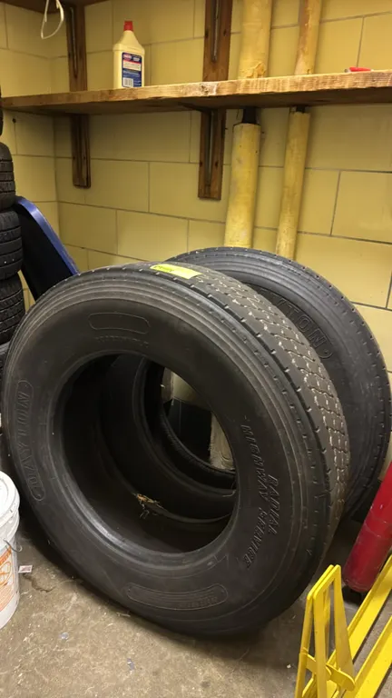 Dayton Radial Highway Service semi-truck tires. Features regroovable and tubeless steel-belted radial construction. Size: 295/75R22.5. Load Range G wi