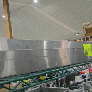 Stainless steel wall-mount speed rail. Features a front lip to secure bottles or containers and keyhole mounting slots on the back panel. 42"L.