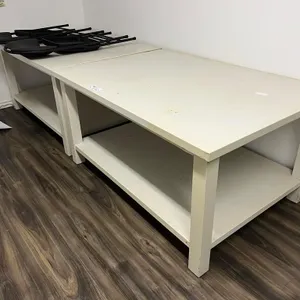 (2) White Tables w/ (2) Folding Chairs
 UNRESERVED
