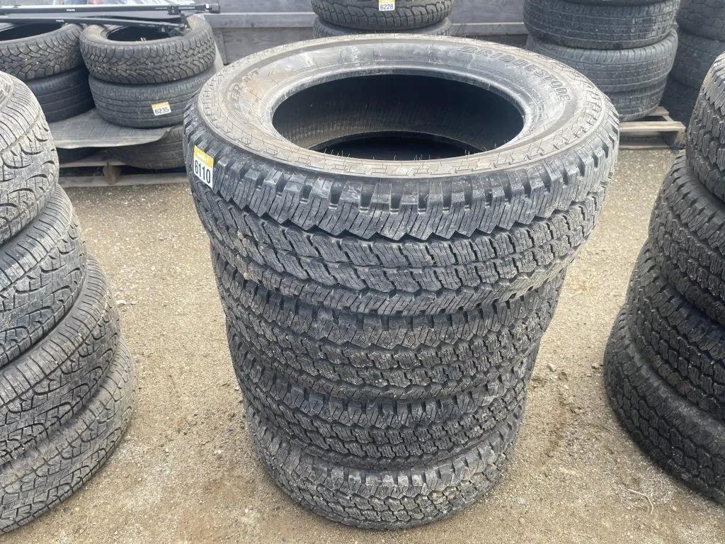 Four Bridgestone Tires - LT275/65R20
